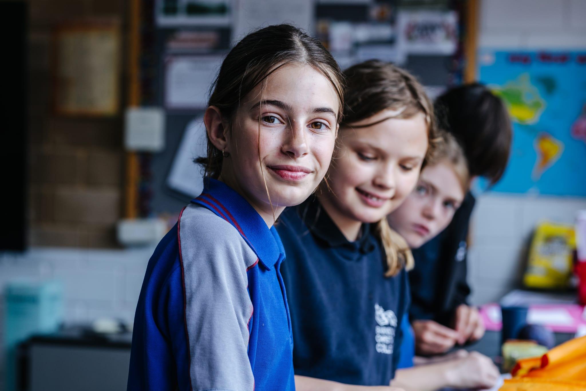 Primary students engaged in classroom learning, highlighting confidence, creativity, and faith-based leadership development at a Christian school.