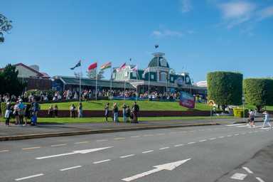 Large group of distance education students on excursion outside Dreamworld
