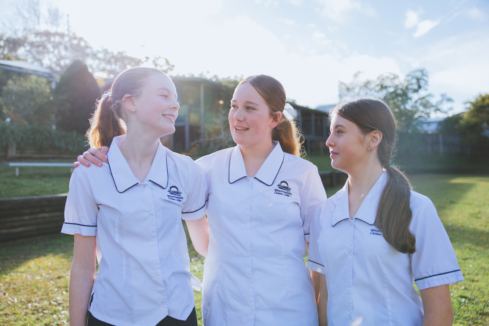 Brightwaters Christian College high school students standing in front of school building