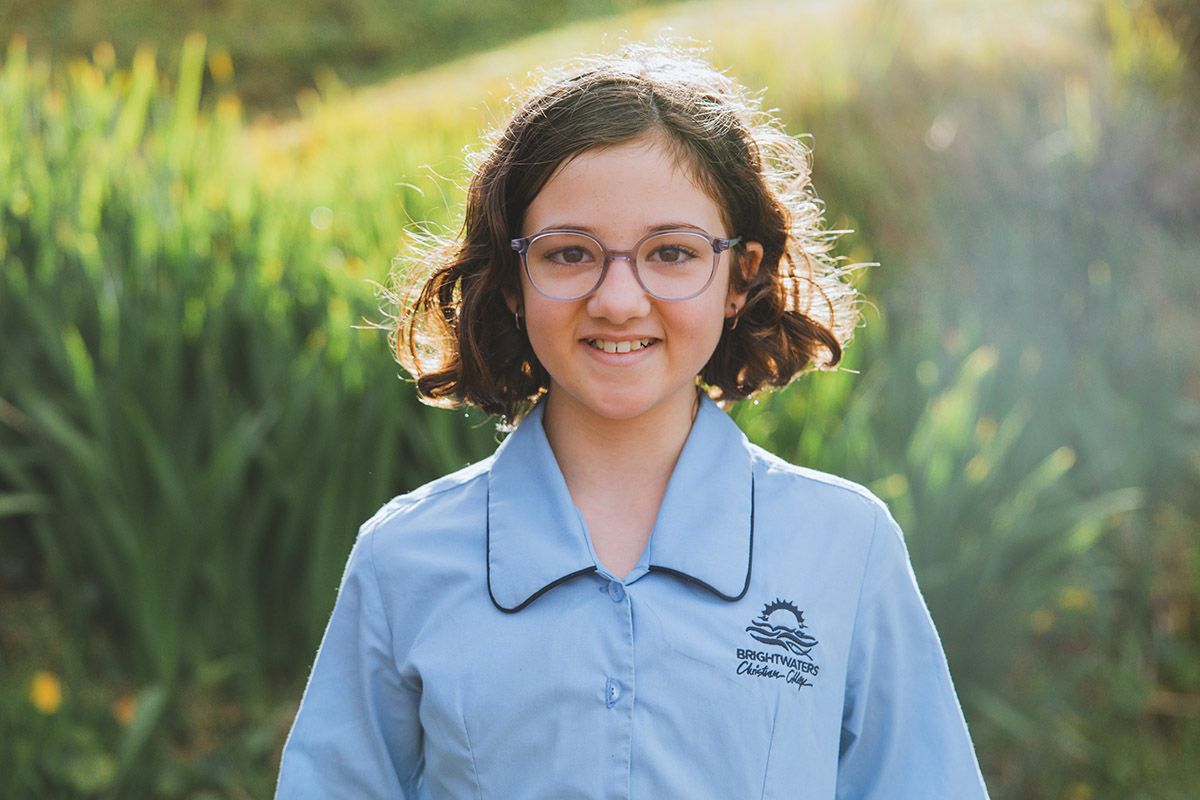 Smiling well adjusted female highschool student