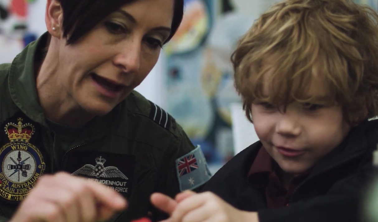 female air force officer mentoring a Medowie school student in defence support mentor program