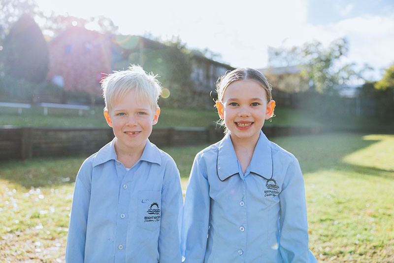 Students sitting on floor of Lake Macquarie classroom drawing together